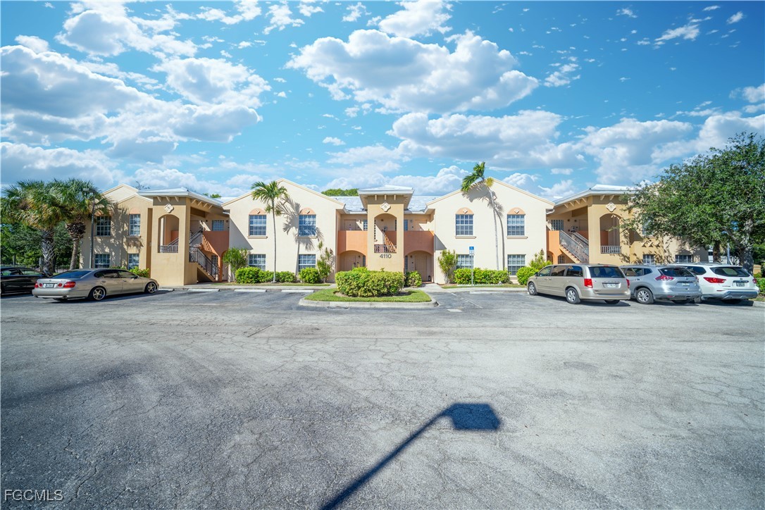 4110 Castilla Circle, Unit 105 Fort Myers, FL 33916 - Photo 20 of 37 a view of multiple houses with a street