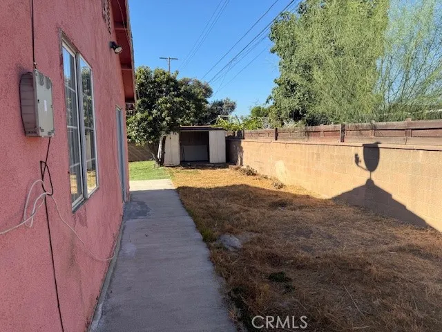 a view of a swimming pool with an outdoor seating