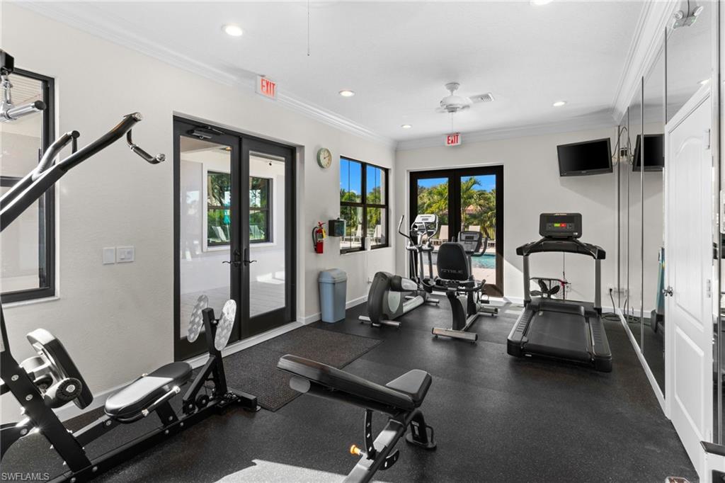 2421 Ravenna Boulevard, Unit 202 Naples, FL 34109 - Photo 36 of 42 a view of a room with gym equipment