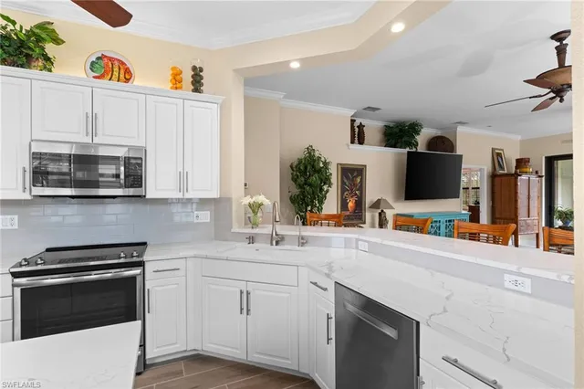 $870,000 | 2421 Ravenna Boulevard, Unit 202, Naples, FL 34109