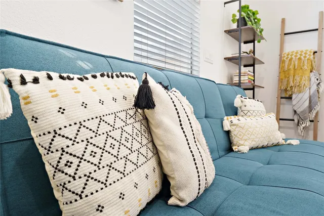 a bed room with a bed and a couch