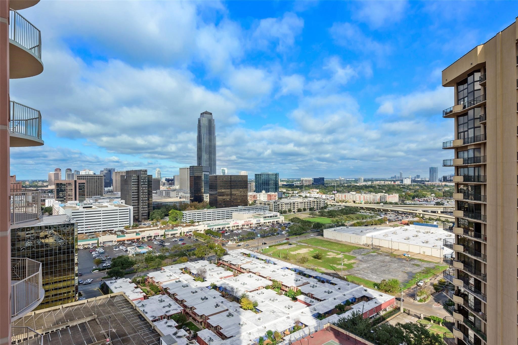 3505 Sage Road, Unit 2210 Houston, TX 77056 - Photo 12 of 40 Sweeping city views unfold from the balcony, offering a striking backdrop of skyline vistas by day and a dazzling display of lights by night.