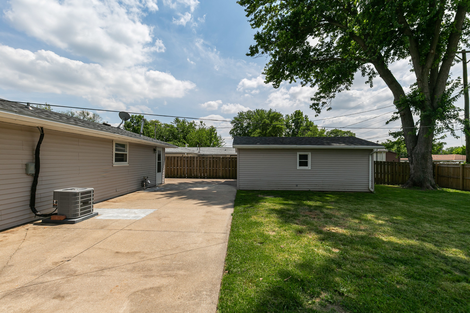 2306 9th Street Silvis, IL 61282 - Photo 5 of 32 a view of a backyard