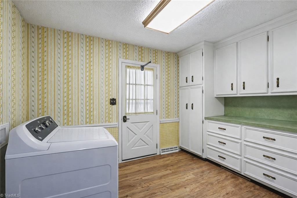 6726 Branson Mill Road Pleasant Garden, NC 27313 - Photo 10 of 32 laundry room boxes cleaned up with AI