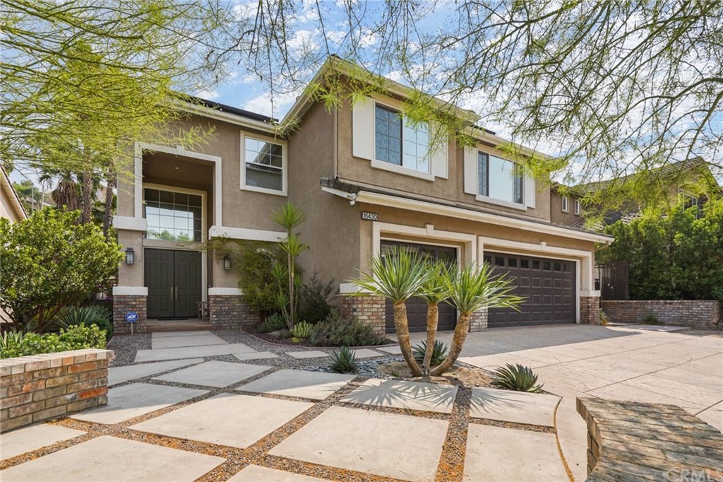 16430 Fair Ridge Court Riverside, CA 92503 - Photo 1 of 1 a front view of a house with garden