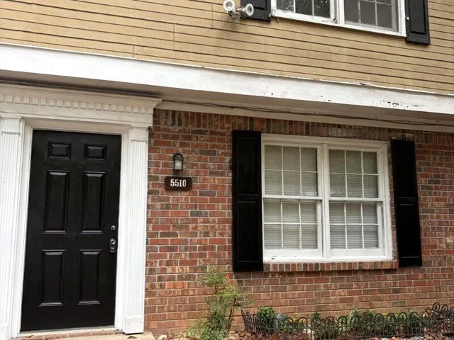 a front view of a brick house