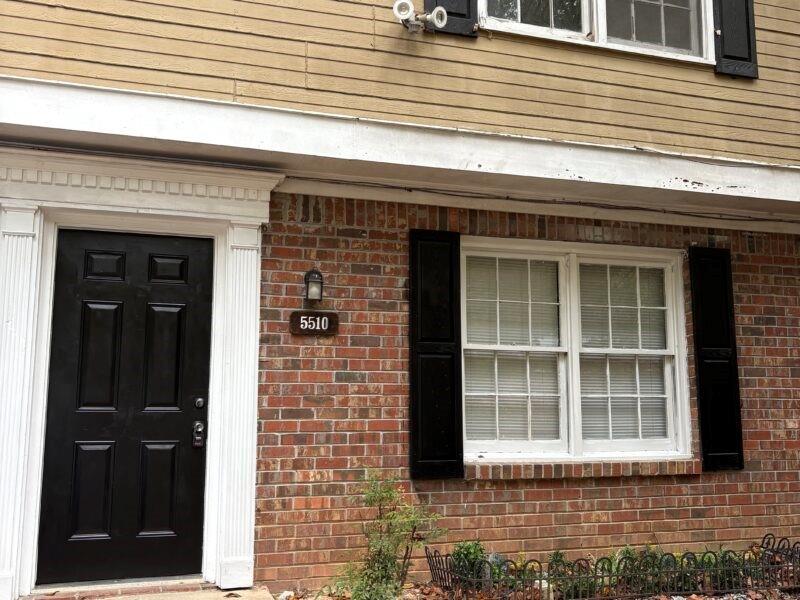 a front view of a brick house