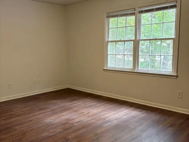 an empty room with a fireplace