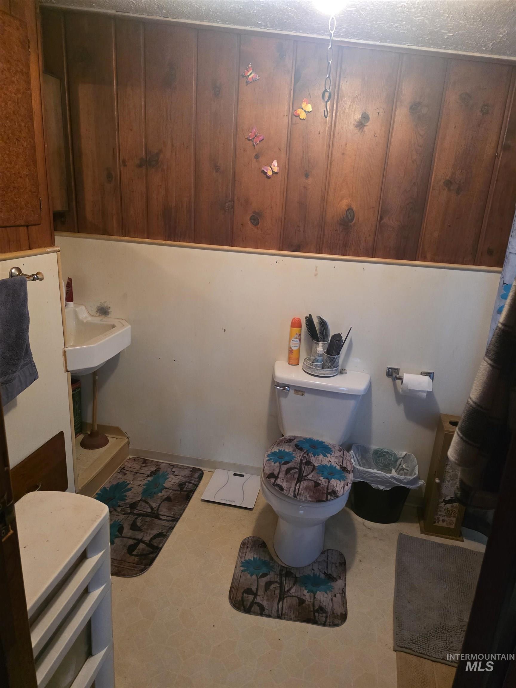 210 Pine Avenue Kooskia, ID 83539 - Photo 7 of 8 Bathroom with light flooring and a textured ceiling