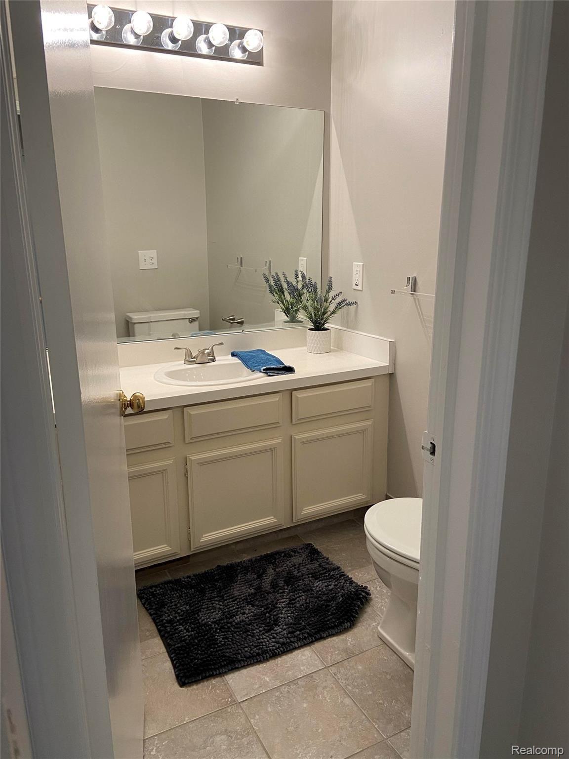 29644 Middlebelt Road, Unit 54 Farmington, MI 48334 - Photo 24 of 31 primary bathroom with walk-in shower