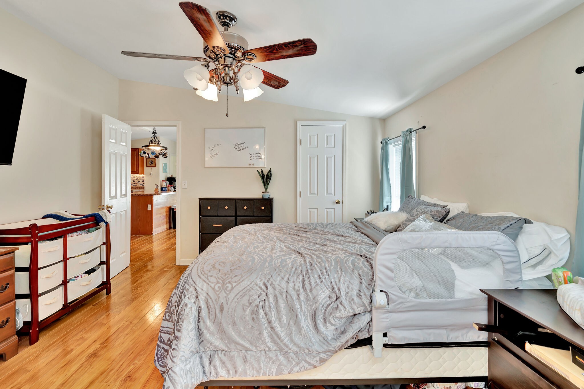 175 B Mitchell Road Portland, TN 37148 - Photo 12 of 29 a bedroom with a bed and wooden floor