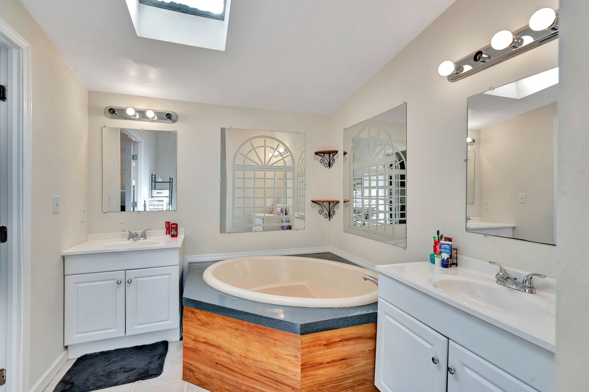175 B Mitchell Road Portland, TN 37148 - Photo 13 of 29 a bathroom with a tub sink and mirror