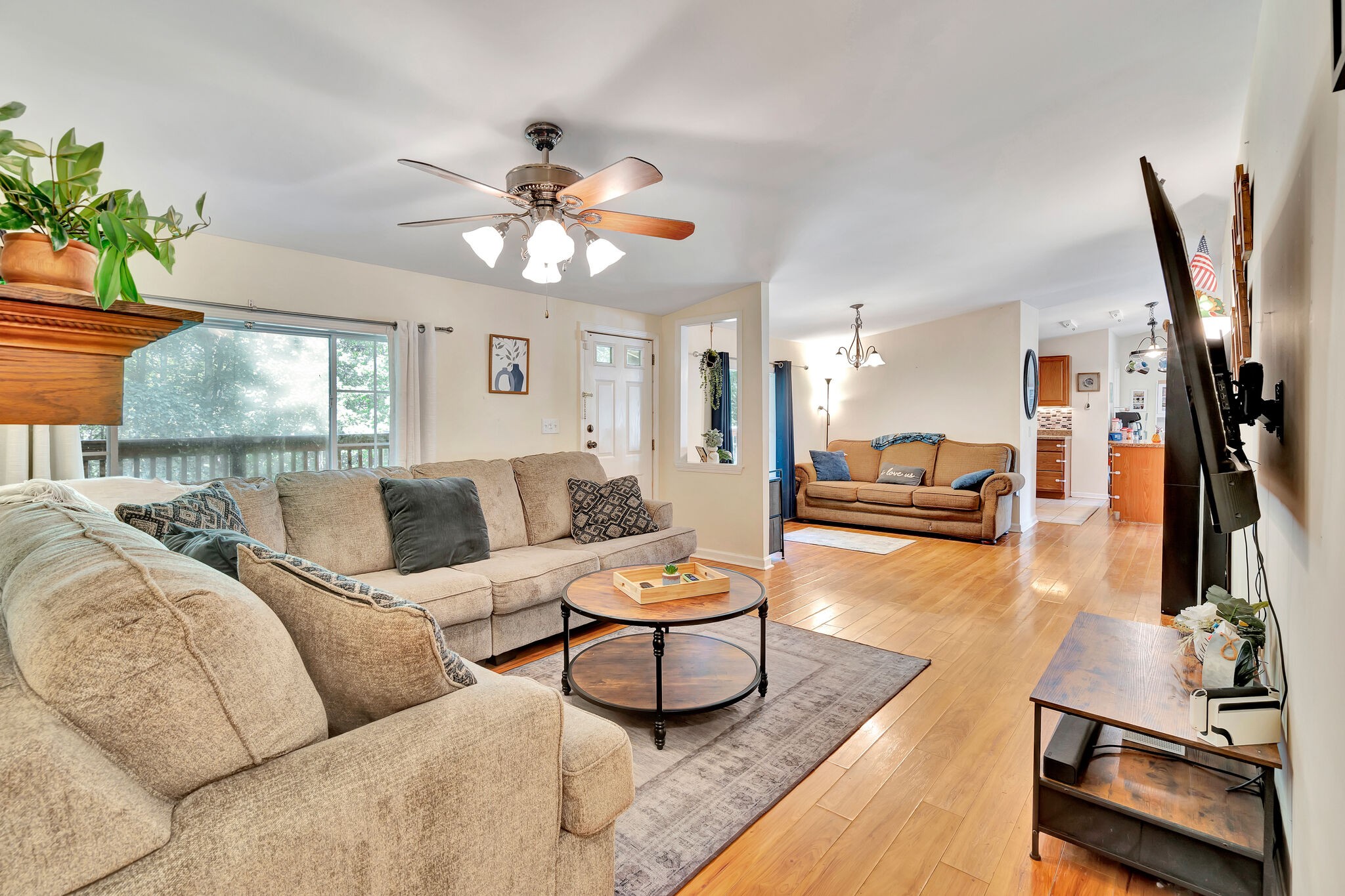 175 B Mitchell Road Portland, TN 37148 - Photo 18 of 29 a living room with furniture a rug potted plant and a large window