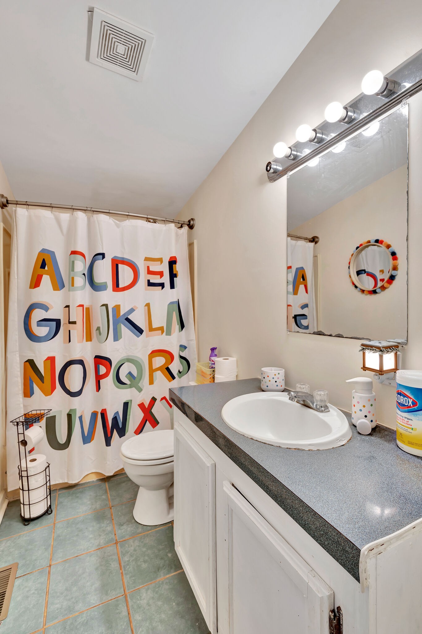 175 B Mitchell Road Portland, TN 37148 - Photo 22 of 29 a bathroom with a sink a toilet and shower curtain