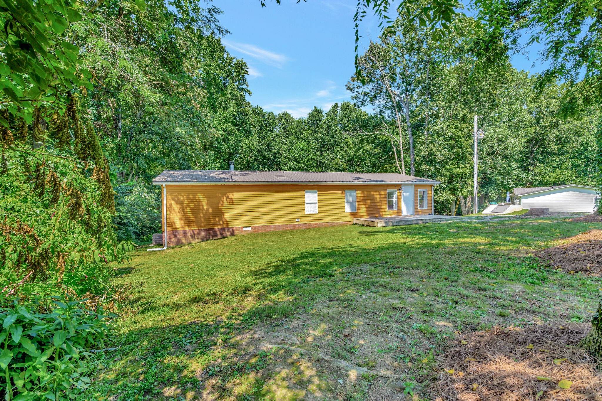 175 B Mitchell Road Portland, TN 37148 - Photo 3 of 29 a view of a house with a yard