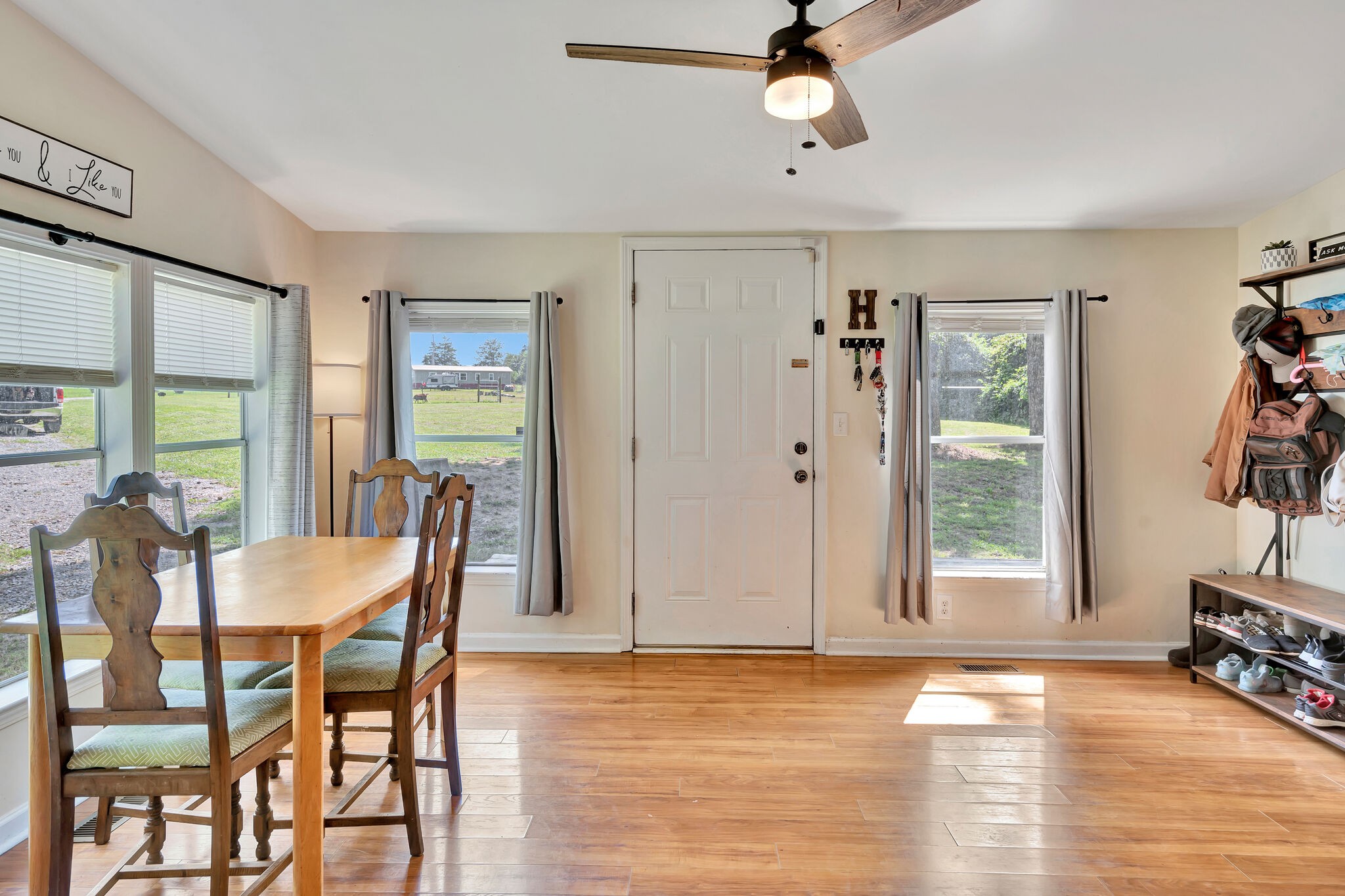 175 B Mitchell Road Portland, TN 37148 - Photo 6 of 29 a view of a dining room with furniture window and wooden floor