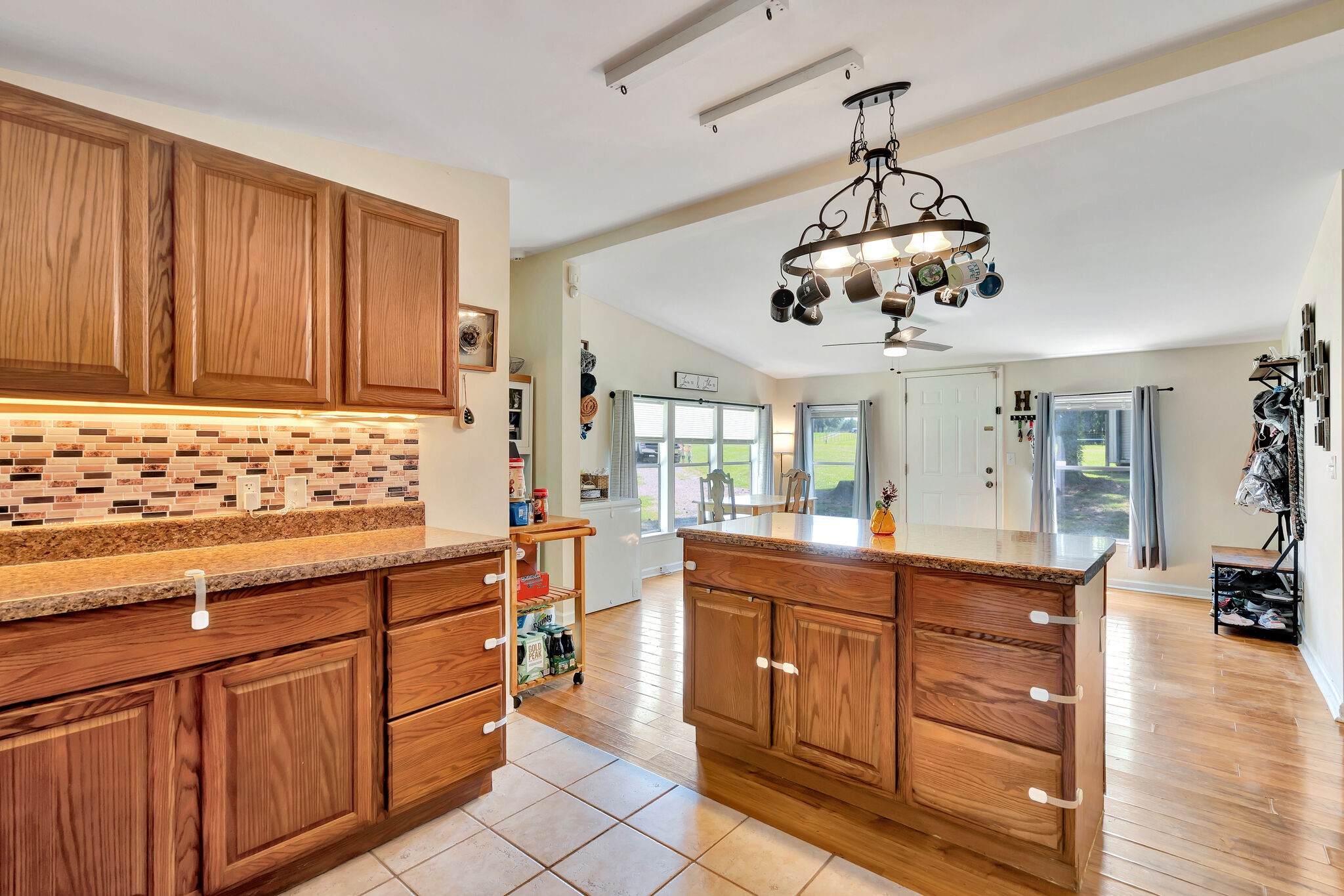 175 B Mitchell Road Portland, TN 37148 - Photo 9 of 29 a kitchen with stainless steel appliances kitchen island granite countertop a stove and cabinets