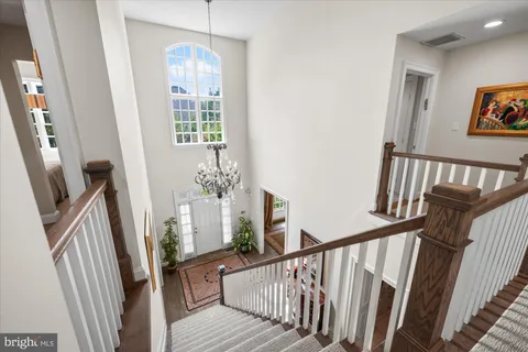 a view of balcony with wooden floor