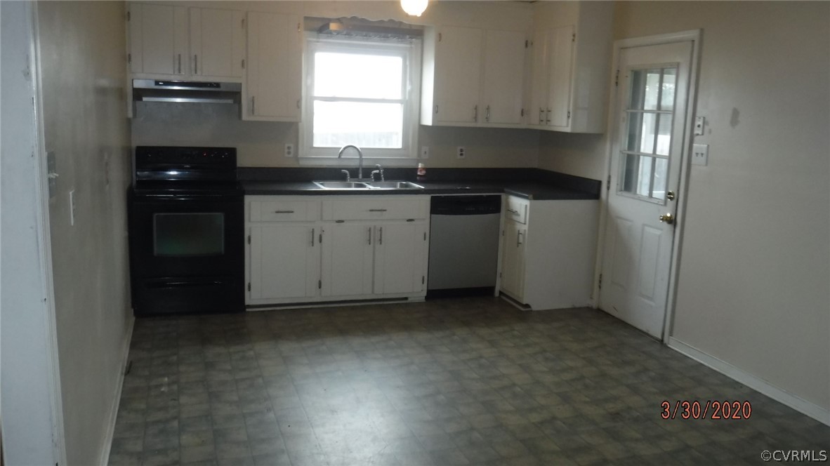 3022 Fielding Road Colonial Heights, VA 23834 - Photo 3 of 12 a kitchen with a sink window and cabinets
