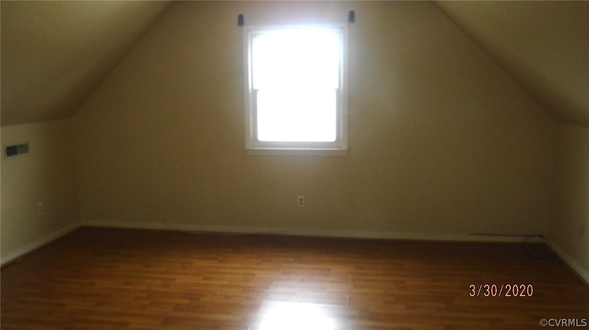 3022 Fielding Road Colonial Heights, VA 23834 - Photo 6 of 12 an empty room with wooden floor and windows