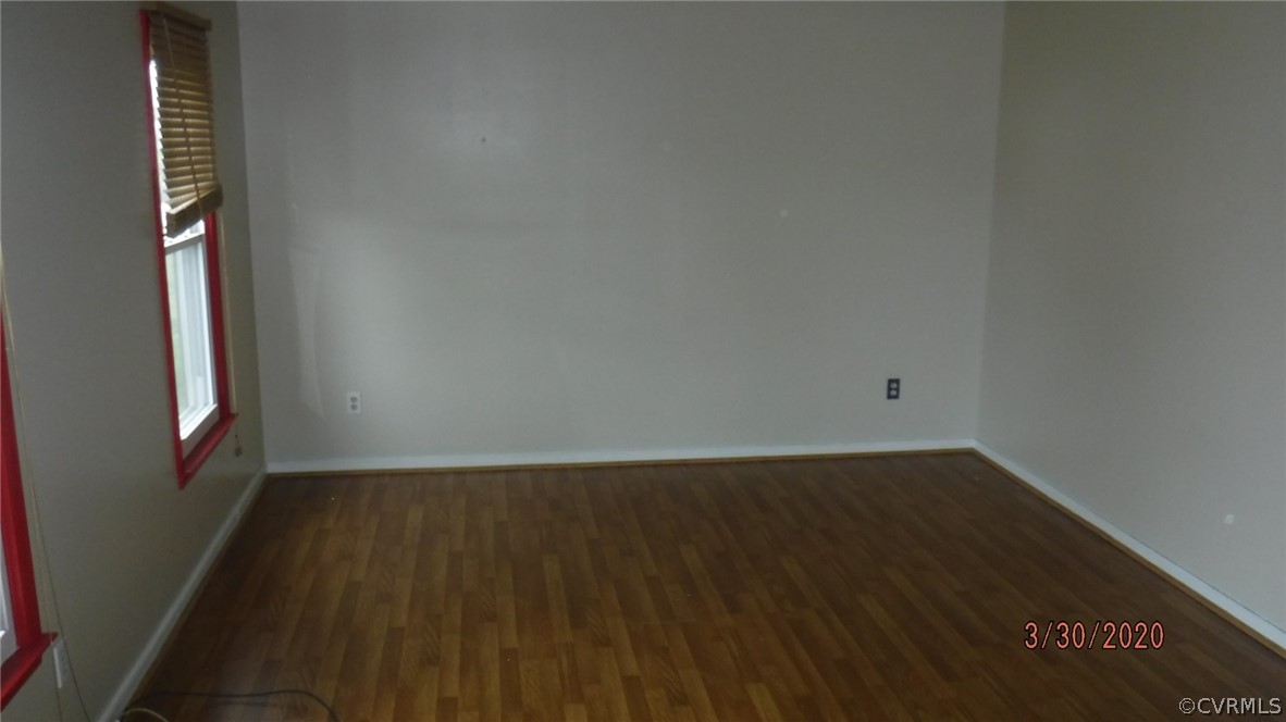 3022 Fielding Road Colonial Heights, VA 23834 - Photo 8 of 12 an empty room with wooden floor and windows