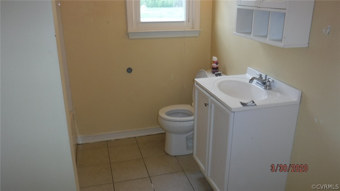 3022 Fielding Road Colonial Heights, VA 23834 - Photo 9 of 12 a bathroom with a sink and a toilet
