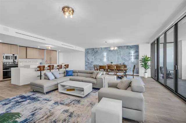 a utility room with sink dryer and washer