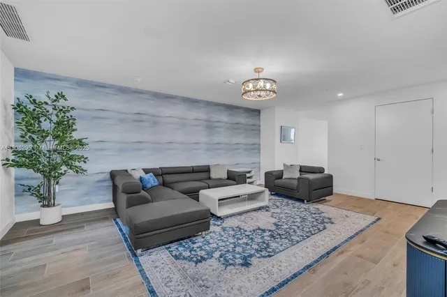 a view of a balcony with lake view and a floor to ceiling window