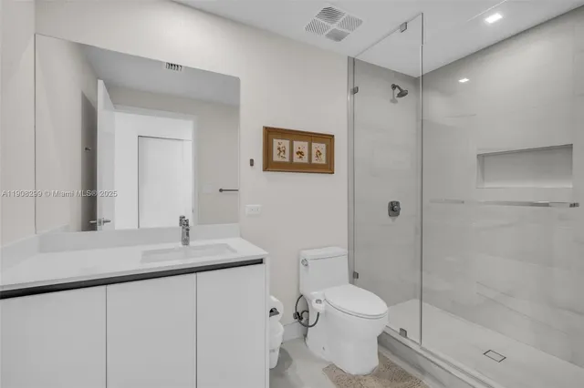 a bathroom with a bathtub and a sink