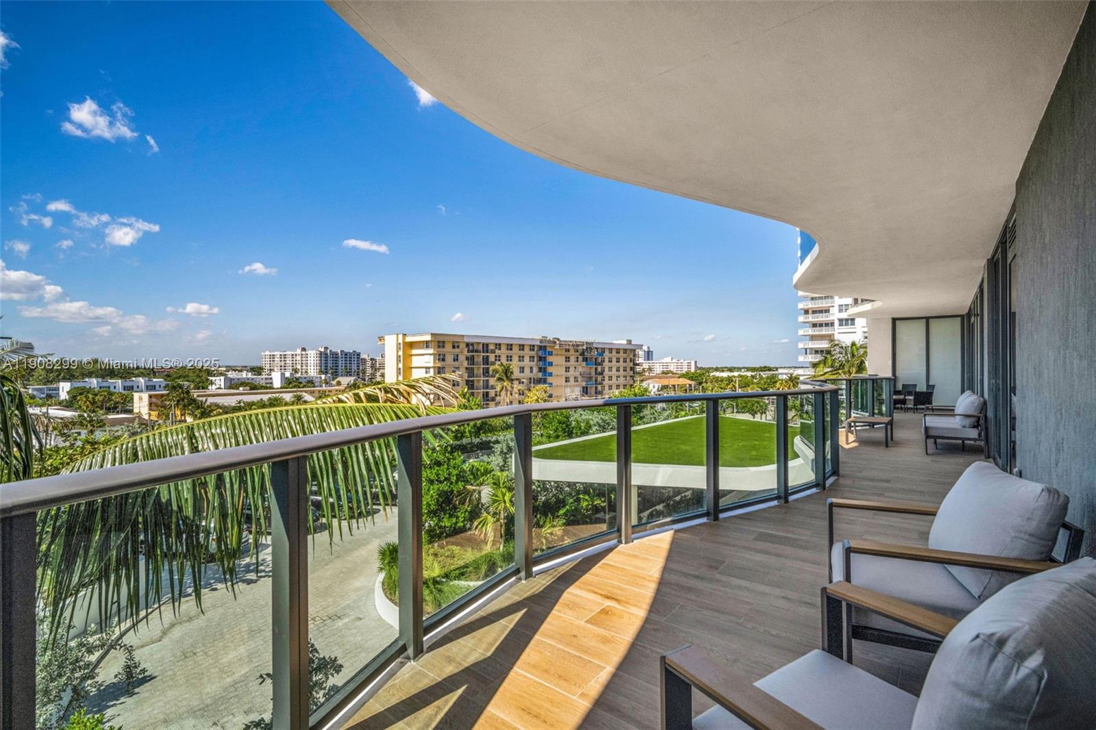 900 North Ocean Boulevard, Unit 503 Pompano Beach, FL 33062 - Photo 35 of 99 a view of a balcony with lake view and a floor to ceiling window