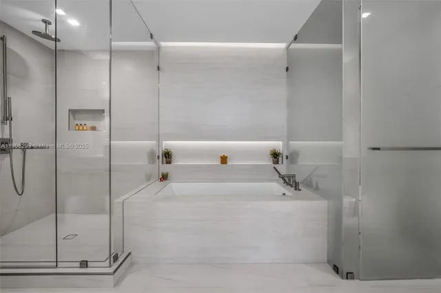 a view of swimming pool with outdoor seating and palm tree