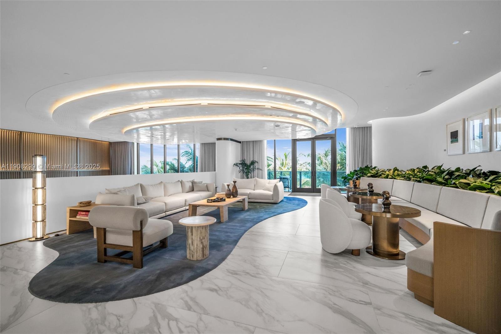 900 North Ocean Boulevard, Unit 503 Pompano Beach, FL 33062 - Photo 53 of 99 a living room with fireplace furniture and a large window