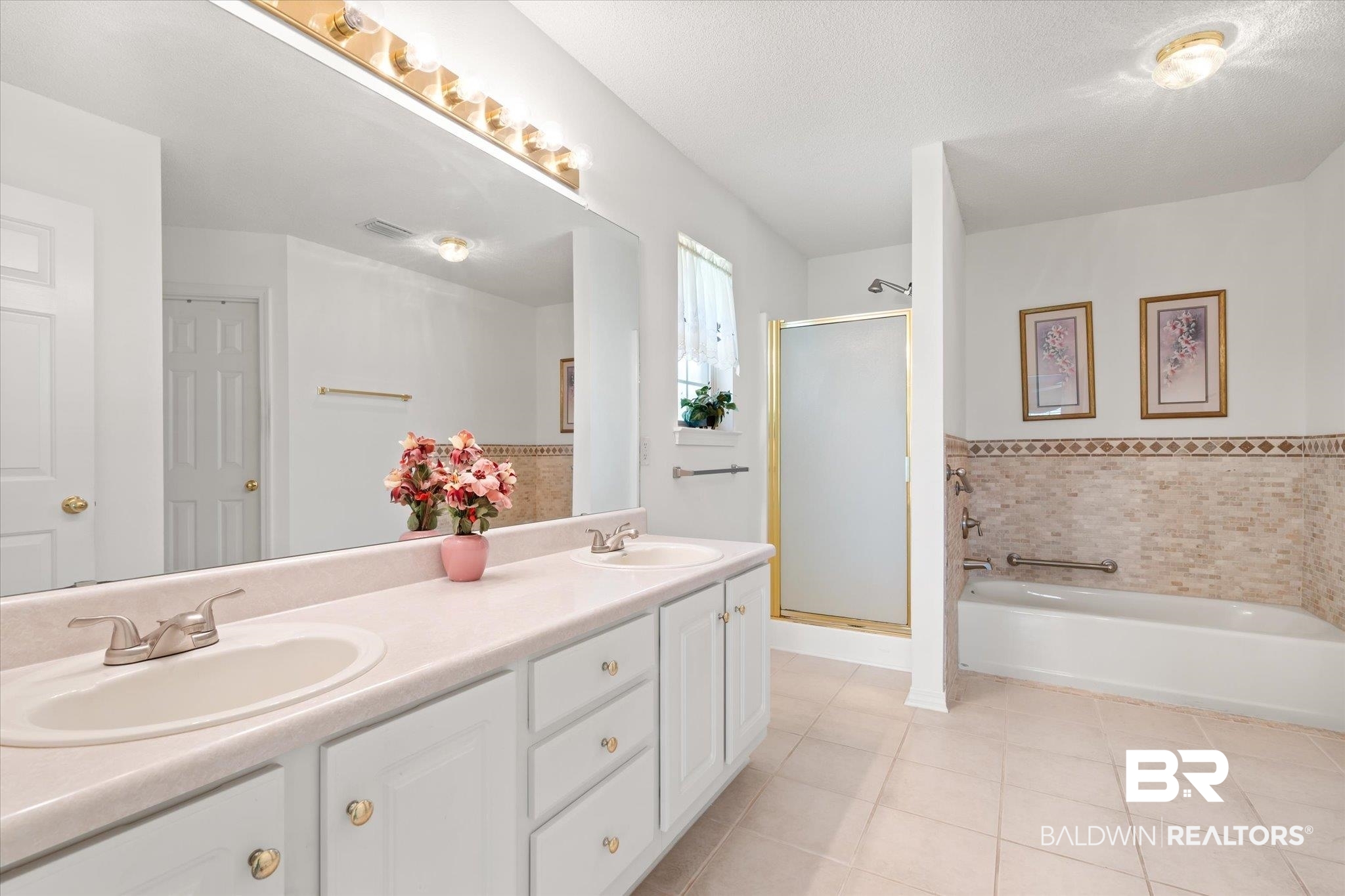 12520 Hunters Chase Foley, AL 36535 - Photo 25 of 32 Full bath with a bath, tile patterned flooring, a stall shower, and a sink