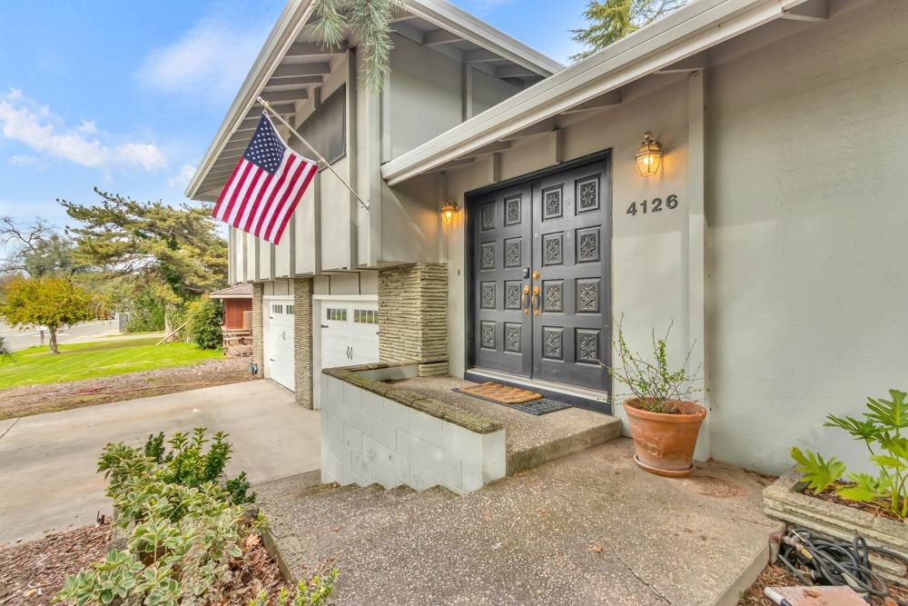 a view of a street with sitting area