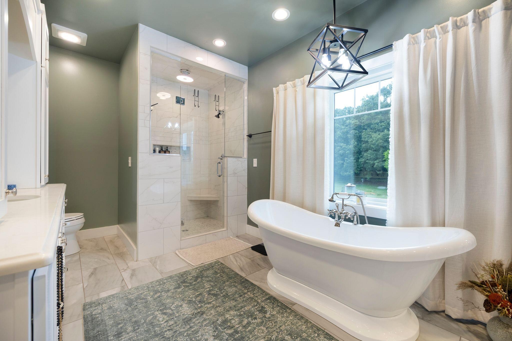 6866 Daus Mountain Road Whitwell, TN 37397 - Photo 23 of 49 a bathroom with a sink toilet and shower