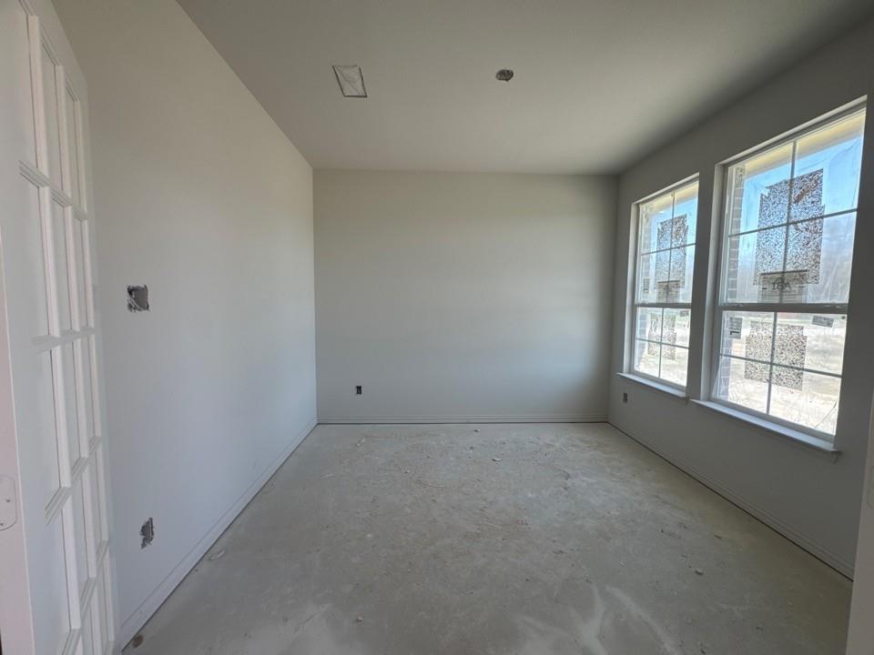 8755 County Road 623 Blue Ridge, TX 75424 - Photo 4 of 15 a view of an empty room with a window