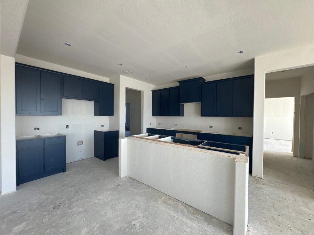 8755 County Road 623 Blue Ridge, TX 75424 - Photo 6 of 15 a kitchen with stainless steel appliances a sink a stove a refrigerator and cabinets