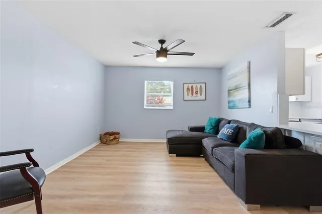 a view of empty room with windows