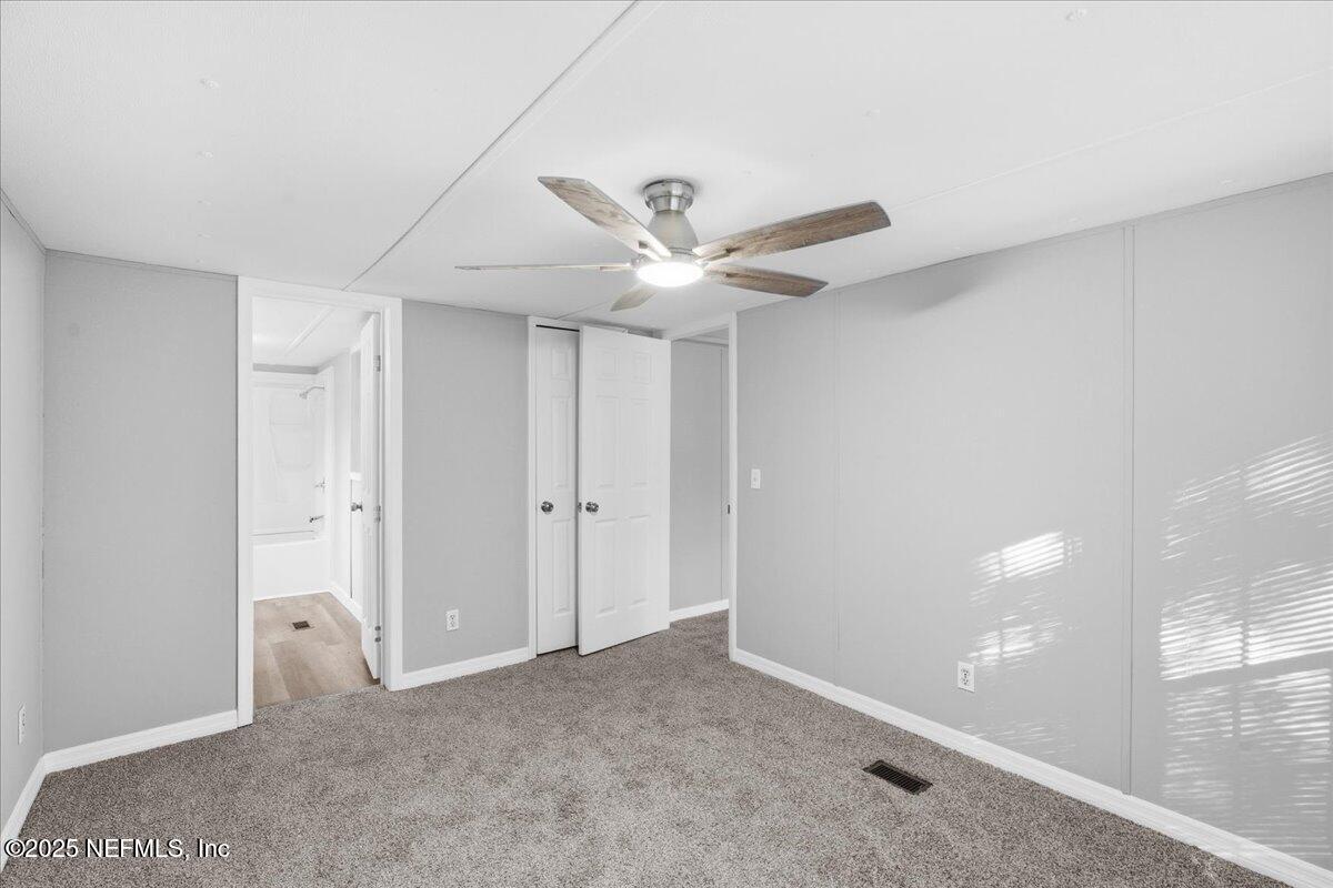 6480 Keith Griffis Circle Macclenny, FL 32063 - Photo 18 of 50 a view of an empty room