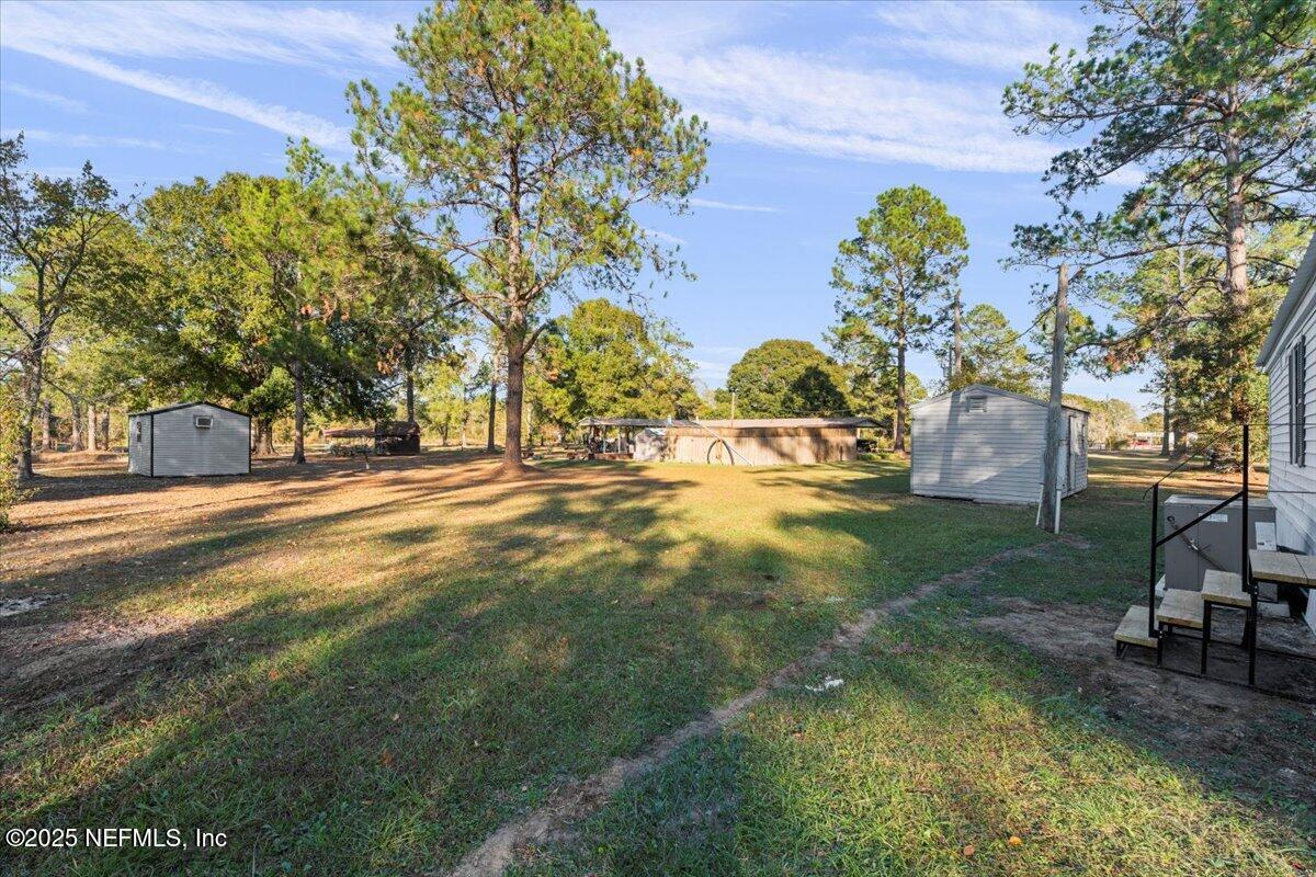 6480 Keith Griffis Circle Macclenny, FL 32063 - Photo 30 of 50 a view of yard with tree s