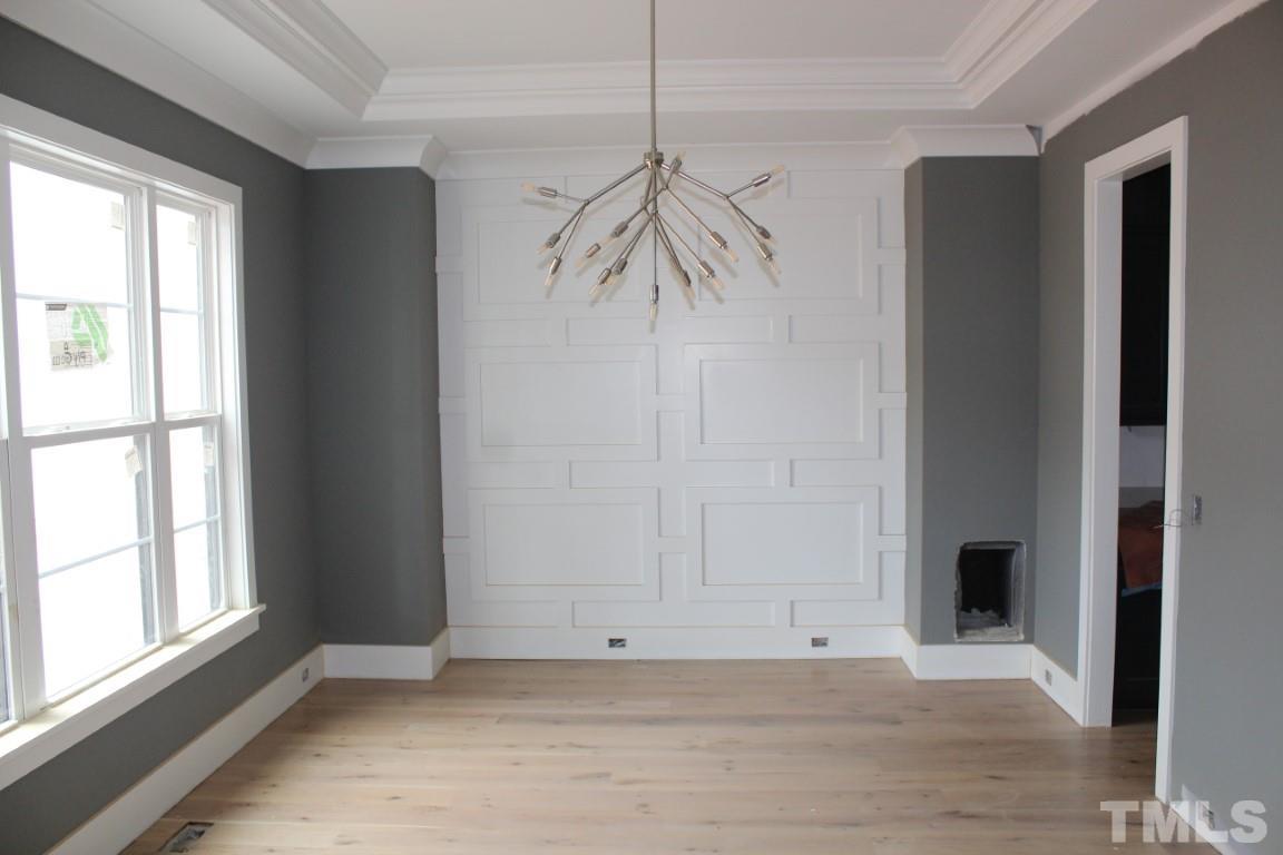 2309 Sanctuary Drive Raleigh, NC 27606 - Photo 2 of 22 a view of an empty room with a window