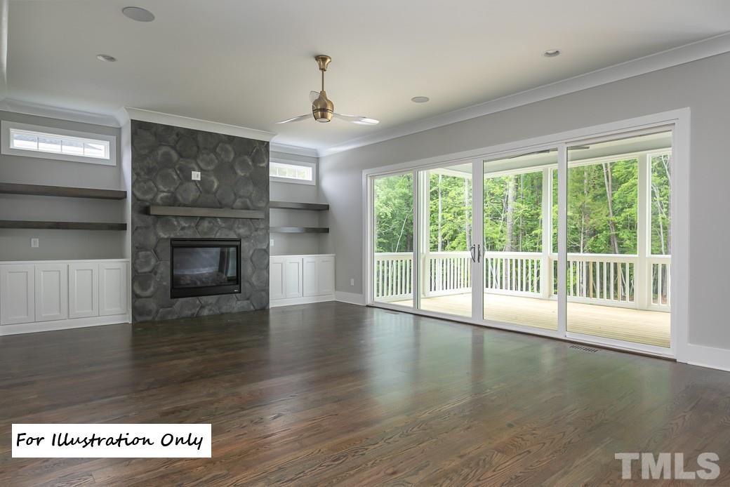 2309 Sanctuary Drive Raleigh, NC 27606 - Photo 14 of 22 a view of an empty room with wooden floor and a window