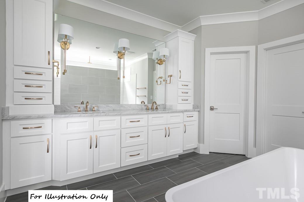 2309 Sanctuary Drive Raleigh, NC 27606 - Photo 18 of 22 a spacious bathroom with a granite countertop sink and a mirror