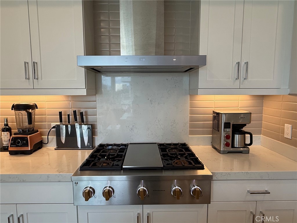 3414 Rivington Irvine, CA 92612 - Photo 15 of 33 a stove top oven sitting inside of a kitchen