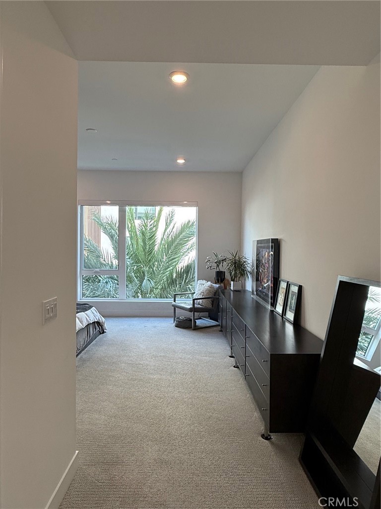 3414 Rivington Irvine, CA 92612 - Photo 16 of 33 a living room with furniture and a floor to ceiling window