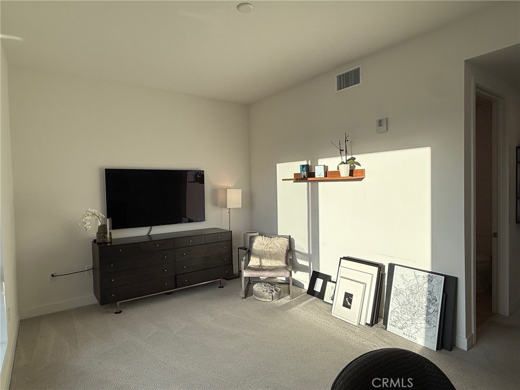 3414 Rivington Irvine, CA 92612 - Photo 31 of 33 a living room with furniture and a flat screen tv