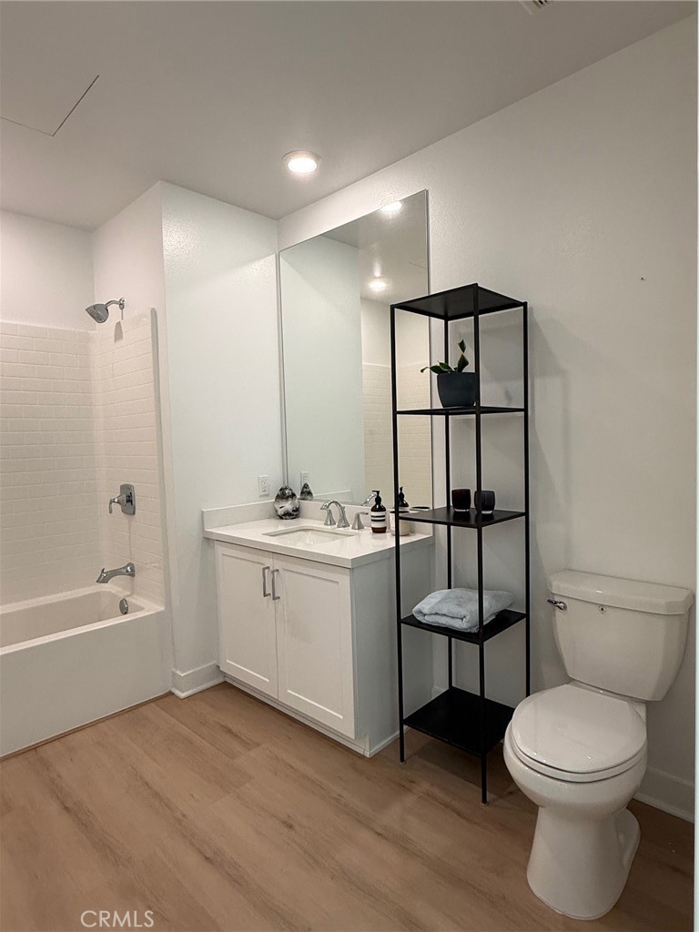 3414 Rivington Irvine, CA 92612 - Photo 32 of 33 a bathroom with a sink toilet and shower