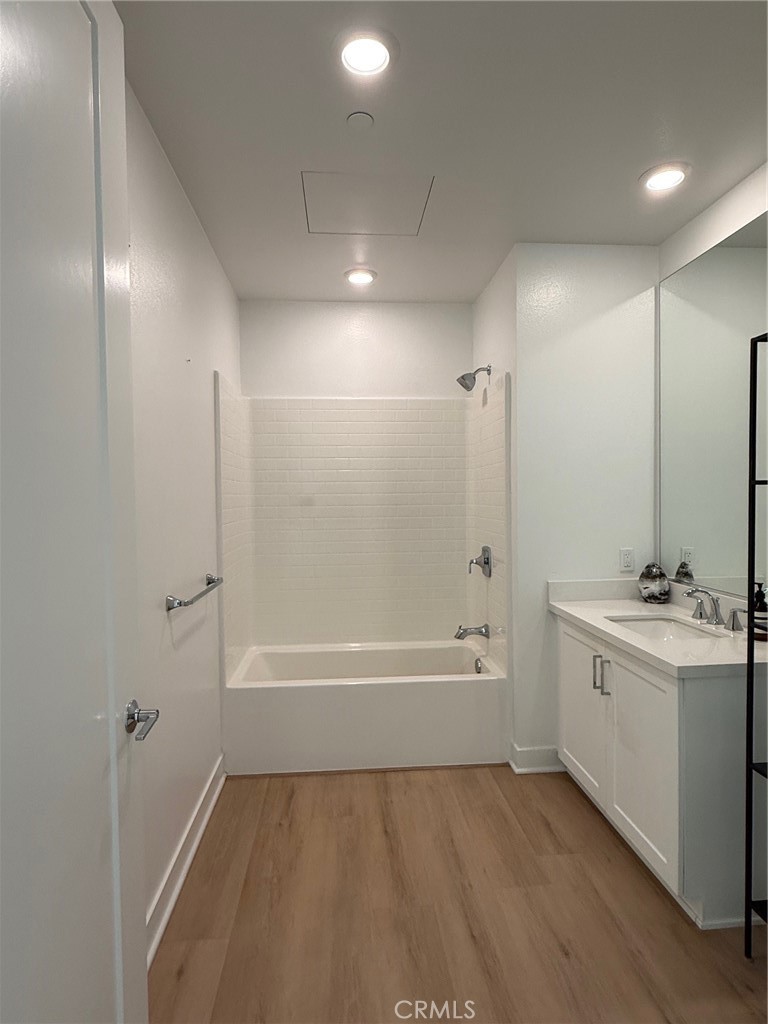 3414 Rivington Irvine, CA 92612 - Photo 33 of 33 a bathroom with a bathtub and a sink