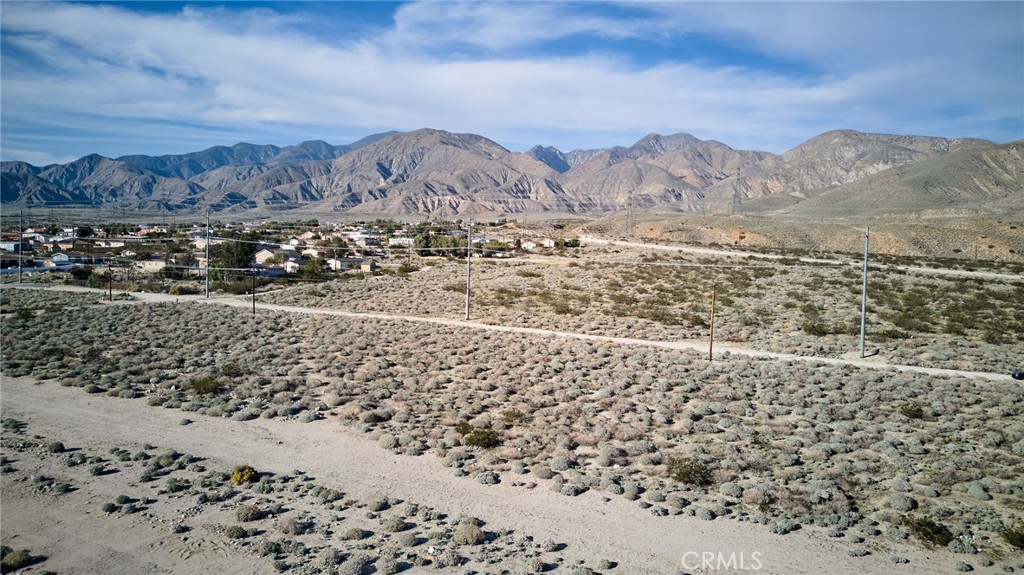 19 Tamarack Road Whitewater, CA 92282 - Photo 4 of 9 a view of a yard with a mountain