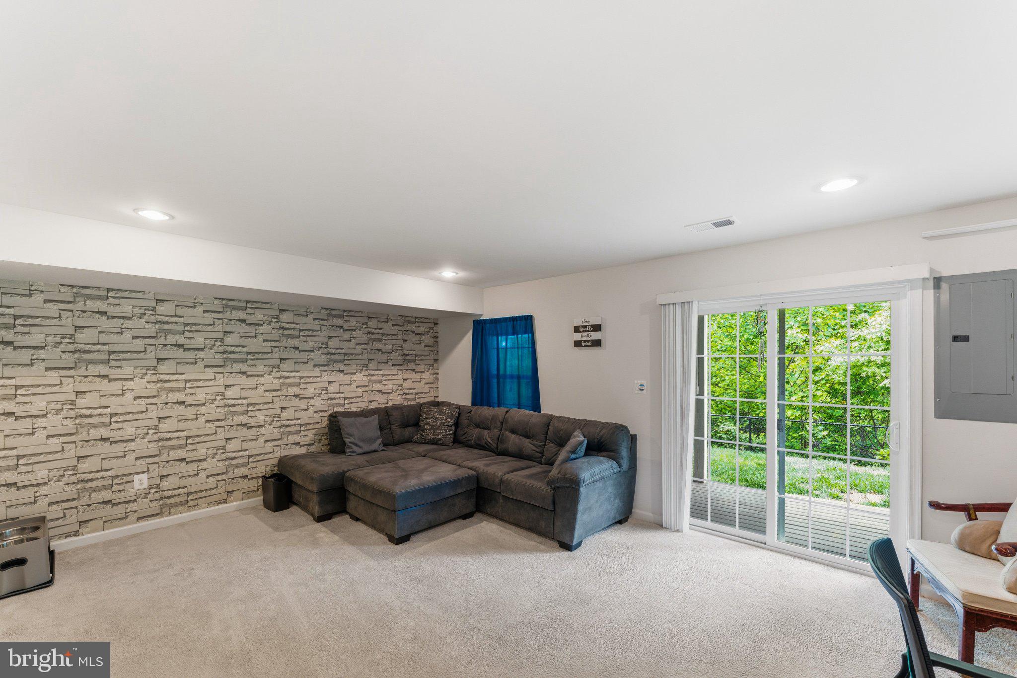 320 Tree Line Drive Fredericksburg, VA 22405 - Photo 11 of 49 a living room with furniture and a fireplace